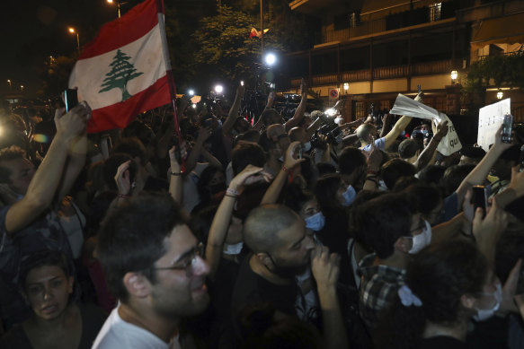 Anti government protesters chant slogans against the Lebanese political class, while French President Emmanuel Macron visits Lebanon's diva Fairouz in Beirut.