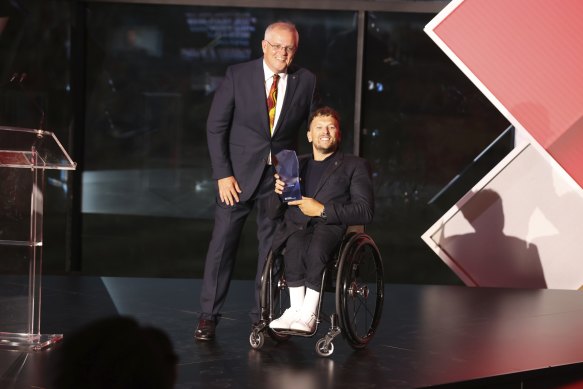 Australian of the year Dylan Alcott and Prime Minister Scott Morrison on  Tuesday night.