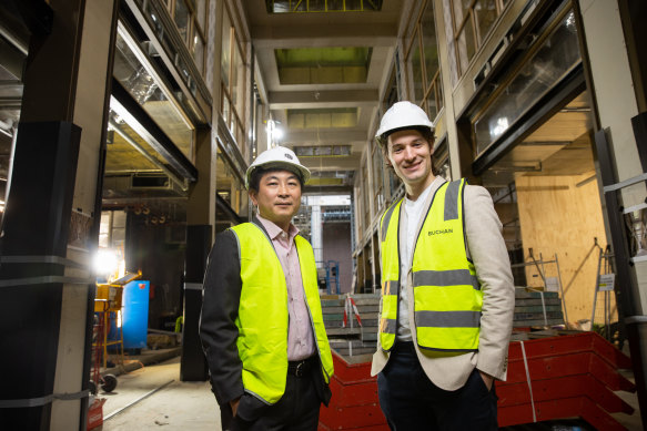Teck-Lay Tay (left), from developer Steadfast Capital, and Hayden Djakic, of architecture firm Buchan, inside the Melbourne Walk development. 