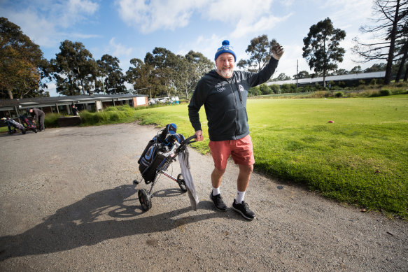 Marshal Toohey celebrates being able to chase a white ball around Yarra Bend Golf Course.