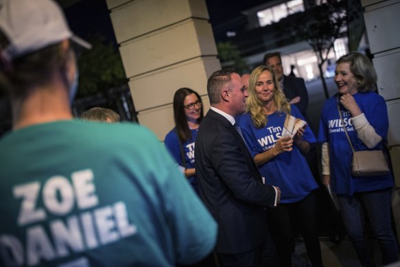 Tim Wilson arrives at the community debate.