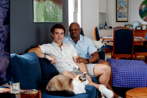 Jay Lynch (left) and Dwone Jones at home in Pyrmont. They were living in Tamworth when they looked into adoption about 12 years ago.