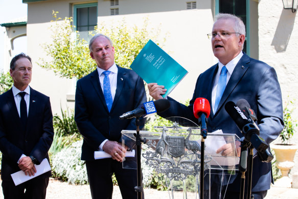Prime Minister Scott Morrison, Health Minister Greg Hunt and Aged Care Minister Richard Colbeck at the release of the final report of the Royal Commission into Aged Care Quality and Safety.