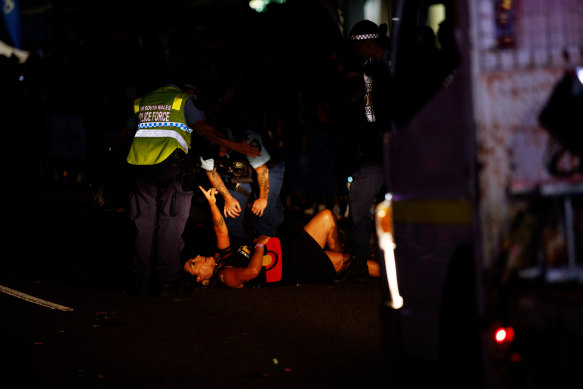 Lidia Thorpe is removed by police after protesting during the Gay and Lesbian Mardi Gras parade. 