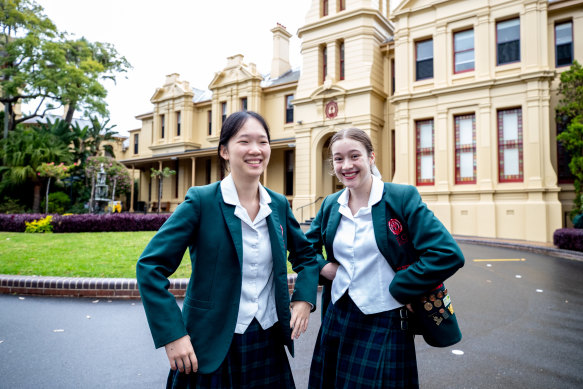 PLC student Amy Feng, who has studied two maths courses in year 12, with year 11 student Anastasia Prokorov. 