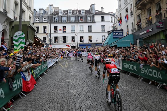 France’s Ewen Costiou, bottom, races up the cobbled streets of Montmartre in Paris on Sunday.