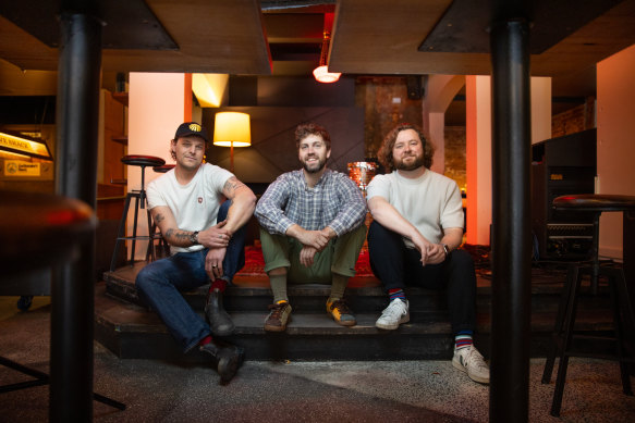 Mark Wilson (left), Matthew Francis and Nathan Farrell run the newly opened Punters Club in Fitzroy.