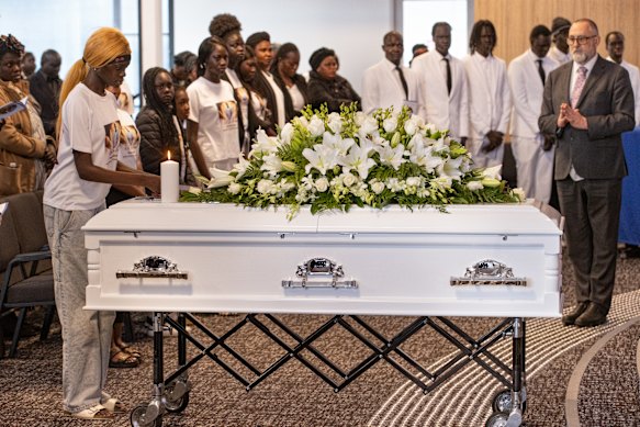 Mourners pay their respects to a boy who died far too young.