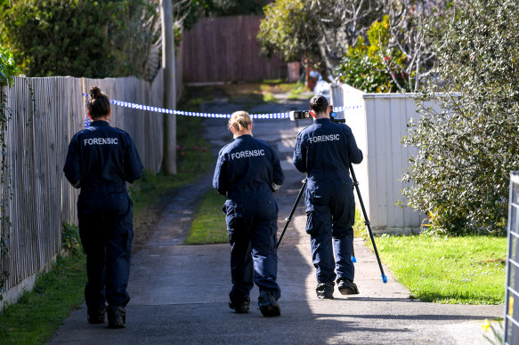 Police at the Mitcham property where two children were rescued on Monday night. 