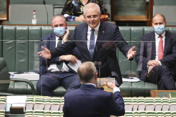 Prime Minister Scott Morrison reacts to Opposition Leader Anthony Albanese in Question Time.
