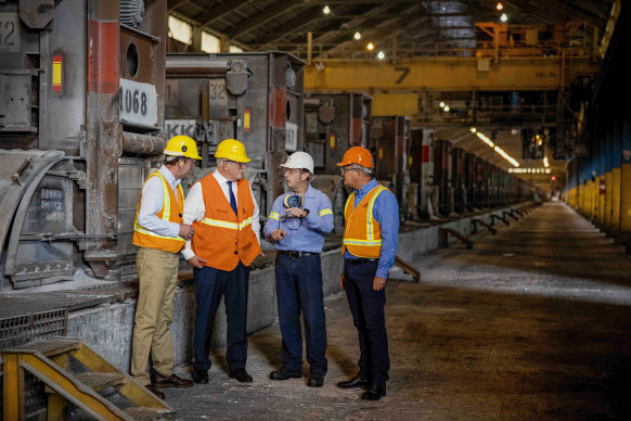Then-prime minister Scott Morrison and then-trade minister Dan Tehan (left) at the Portland smelter in 2021 with Alcoa executives Ron Jorgensen and Michael Gollschewski.