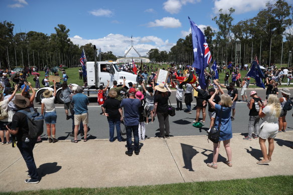 Protesters on the front lawns of Parliament House. 