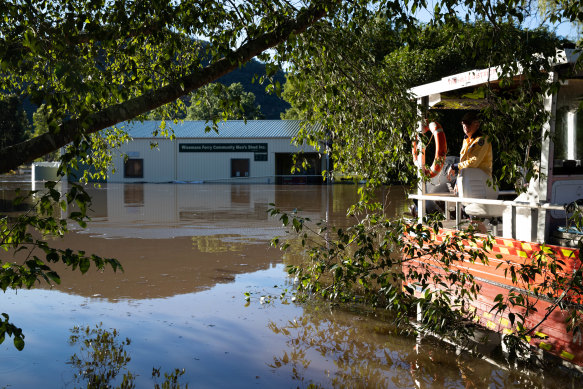 The local RFS prepare to drop food to isolated communities along the Hawkesbury River at Wisemans Ferry. 