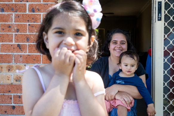 Emilia Bhat, with daughter Amna and son Sismail, says her obstetrician ignored her screams to stop being stitched without adequate pain relief.