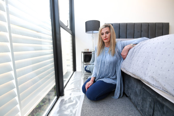 Lee Lits has placed strips of plastic throughout her apartment to protect it from mould after discovering a defect with the waterproofing