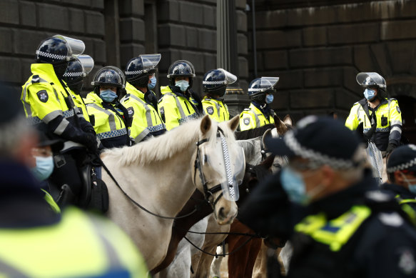 The mounted branch during a protest in  the Melbourne CBD in August. 