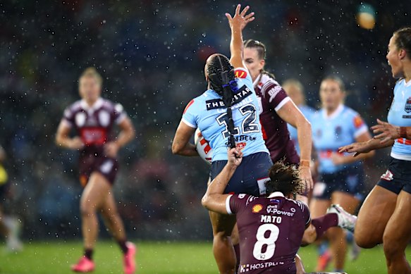 Shannon Mato drags Yasmin Clydsdale down by her hair.