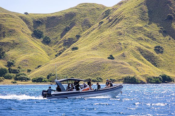 A skiff ride hurtles towards one of the islands.