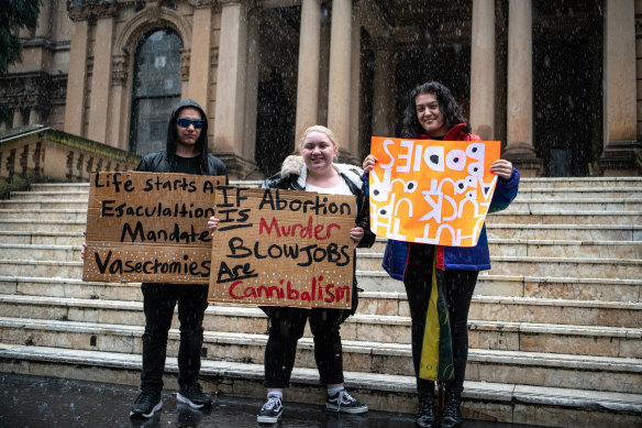 University students Ashley Marsden, Charlotte Butler and Isabella Taylor rallied for abortion rights.