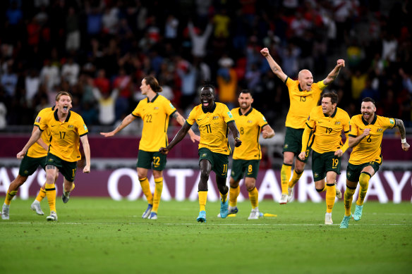 An elated Aaron Mooy jumps for joy after Australia beat Peru to reach the World Cup finals.