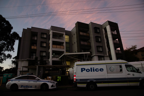 Police guard an apartment block in Blacktown, in Sydney’s west, where residents have been put into 14 days quarantine. 