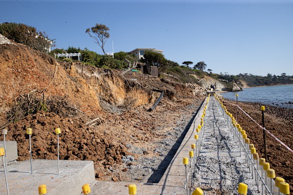 The paused seawall works in March.