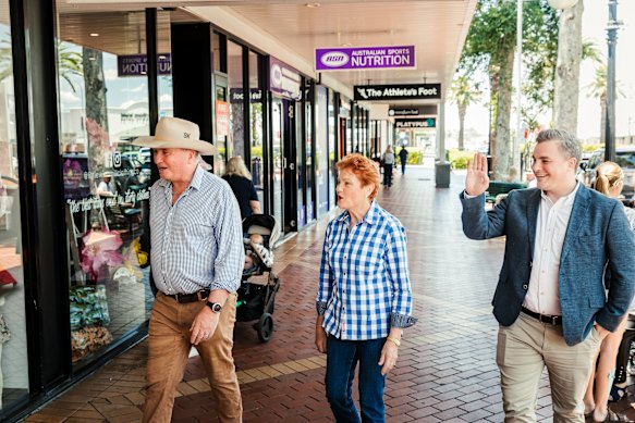 Victory lap … Joyce and Hanson walk down the street in Tamworth on Monday.