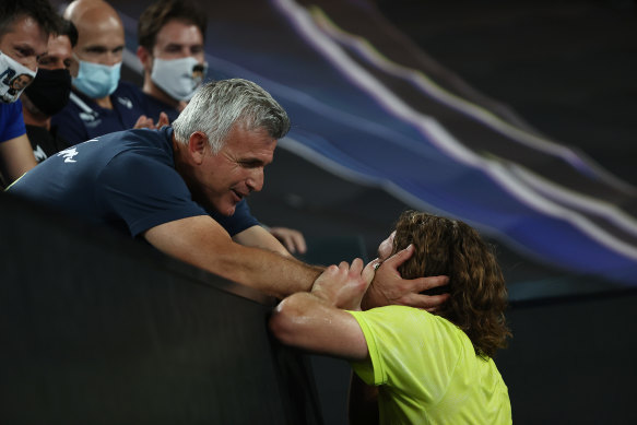 Stefaons Tsitsipas celebrates with his box at the end of the match.