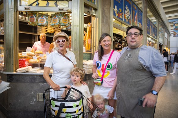 Grace Hicks (centre, with her children, Robert and Stella, and mother, Mary Ferrier, left) has known Michael Caiafa junior (right) her whole life.