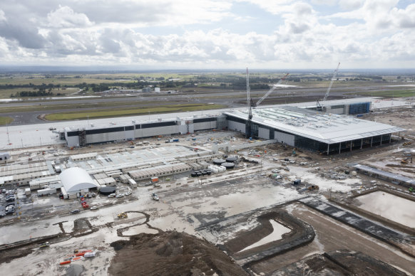 The terminal’s massive roof is due to be completed by July.