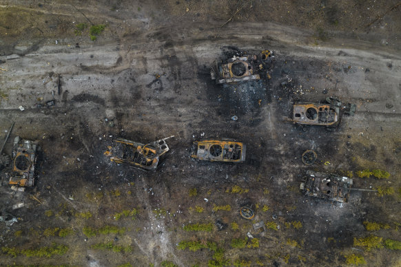 Destroyed Russian armoured vehicles sit on the outskirts of Kyiv.