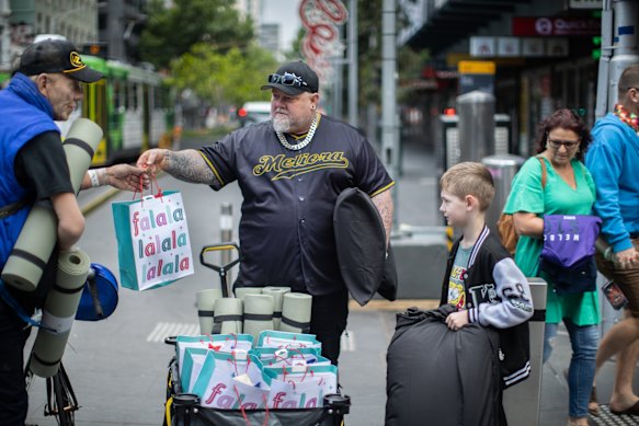 The Glennies hard at work handing out packages. 