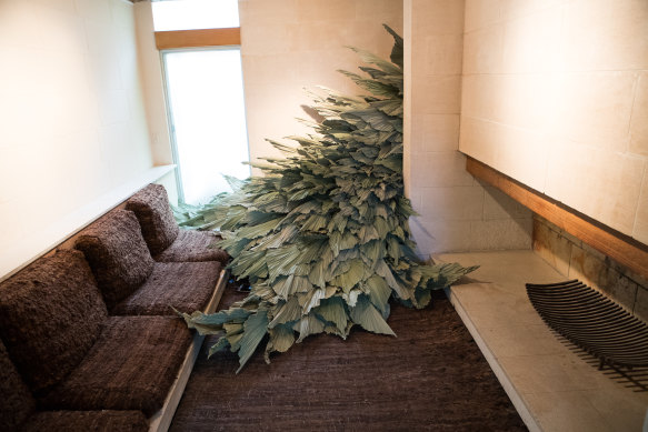 A leaf sculpture begins to take over the Heide lounge room.