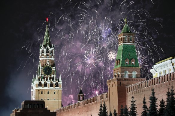 Fireworks explode over the Kremlin in Moscow.