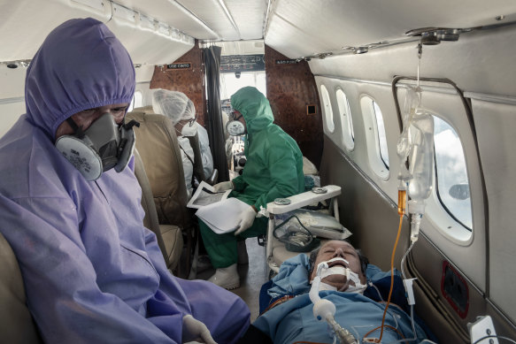 Felicindo Delgado, 68, who had severe coronavirus symptoms, is flown from the village of Coari to receive care in Manaus, days before he died.