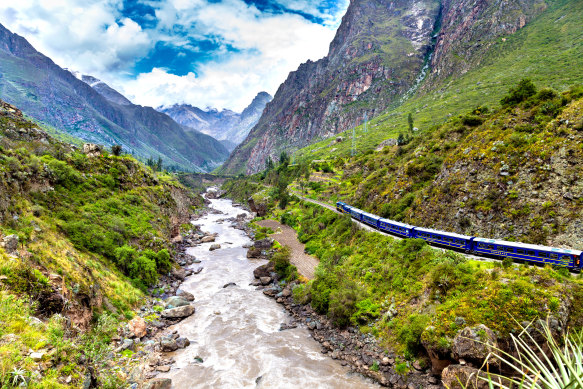 Train on the way to Machu Picchu going alongside the Urubamba River.