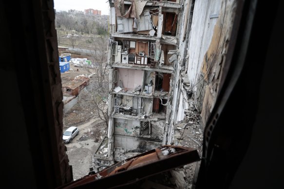 View of an apartment building damaged during heavy fighting in Mariupol in the Russian-controlled Donetsk region.