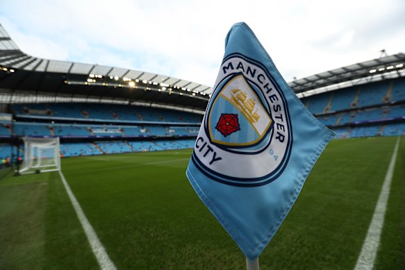 The Manchester City club logo on a corner flag before an English Premier League match.