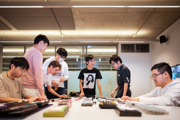 William Pham, centre, with some of his fellow members of the UTS Keyboard Society in Sydney.