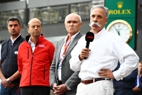 Chase Carey (right), the CEO and executive chairman of the Formula One Group.