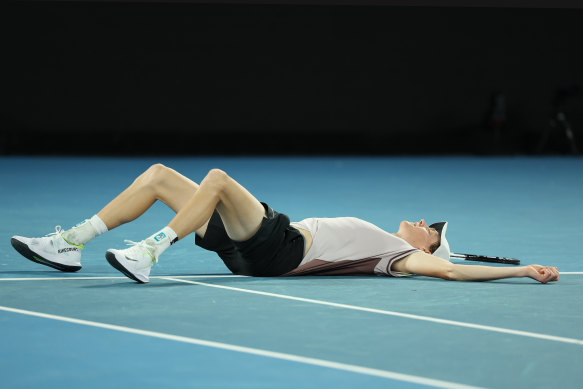 Jannik Sinner of Italy collapses after  winning championship point in the Australian Open mens’ final.