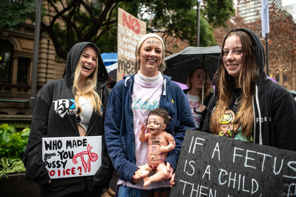 High school students Nina Kulomaa, Taylor Miller and Addison Miller appeared at the abortion rights rally on Saturday.