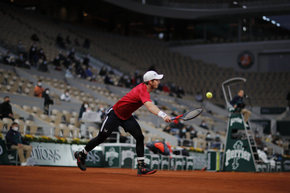 Winter tights, but few spectators: Andy Murray loses to Stan Wawrinka in the opening round.