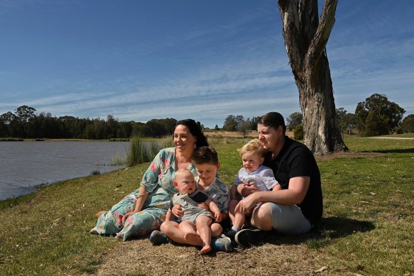 Emma Britton, left, with her husband Tim and sons Rory, 11 months, Oliver, 7, and Elliott, 2.