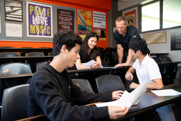 Reddam House advanced maths teacher Antony Charles at the Bondi campus with students Jaison Krutik, Maya Bienstock and Aaron Dong.