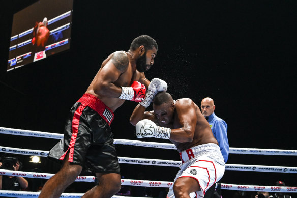 Filimoni Naliva Jr and Baker exchange punches during their fight at Aware Super Theatre in Sydney in March.