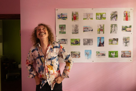 Kim Salmon at home with postcard-sized pictures of some of his artworks: “Art was what I was good at ... Music was something I’ve kind of learned to be able to do.″⁣