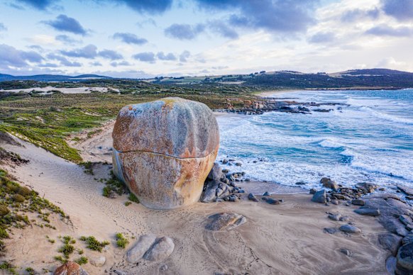 Castle Rock is a massive granite boulder by the shoreline on Marshall Beach.