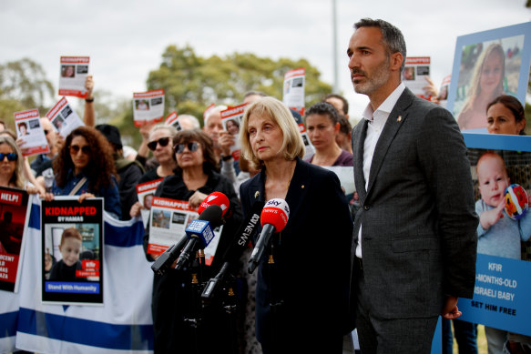 Executive Council of Australian Jewry co-CEO Alex Ryvchin (right) at an event last month about the hostages believed to be held by Hamas.