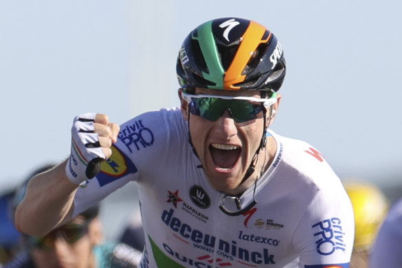 Ireland's Sam Bennett celebrates as he crosses the finish line to win stage 10 of the Tour de France.